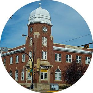 Red clocktower building in Lloydminster, Canada.