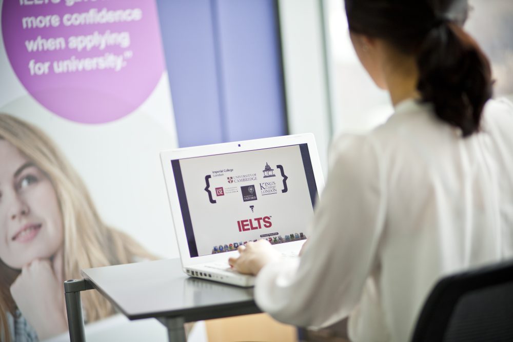 A woman studying for the IELTS